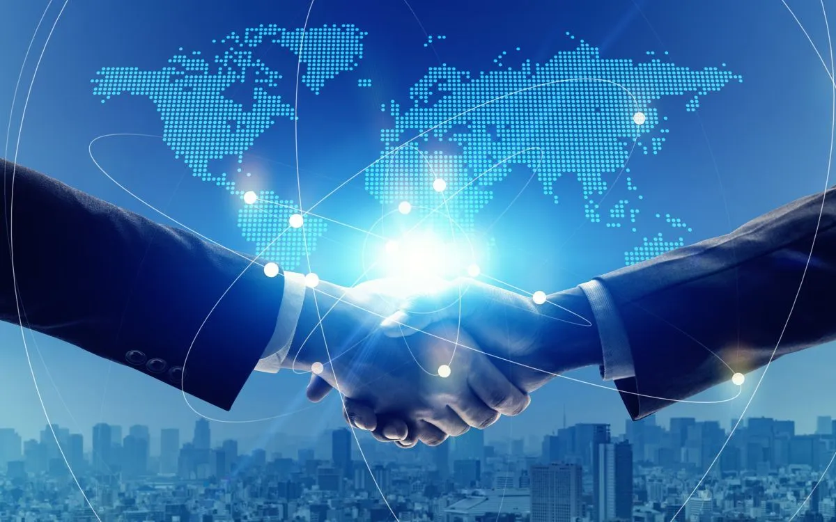 International business partners shaking hands over a commercial agreement